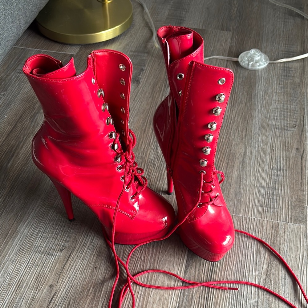 Red vinyl pleaser boots
